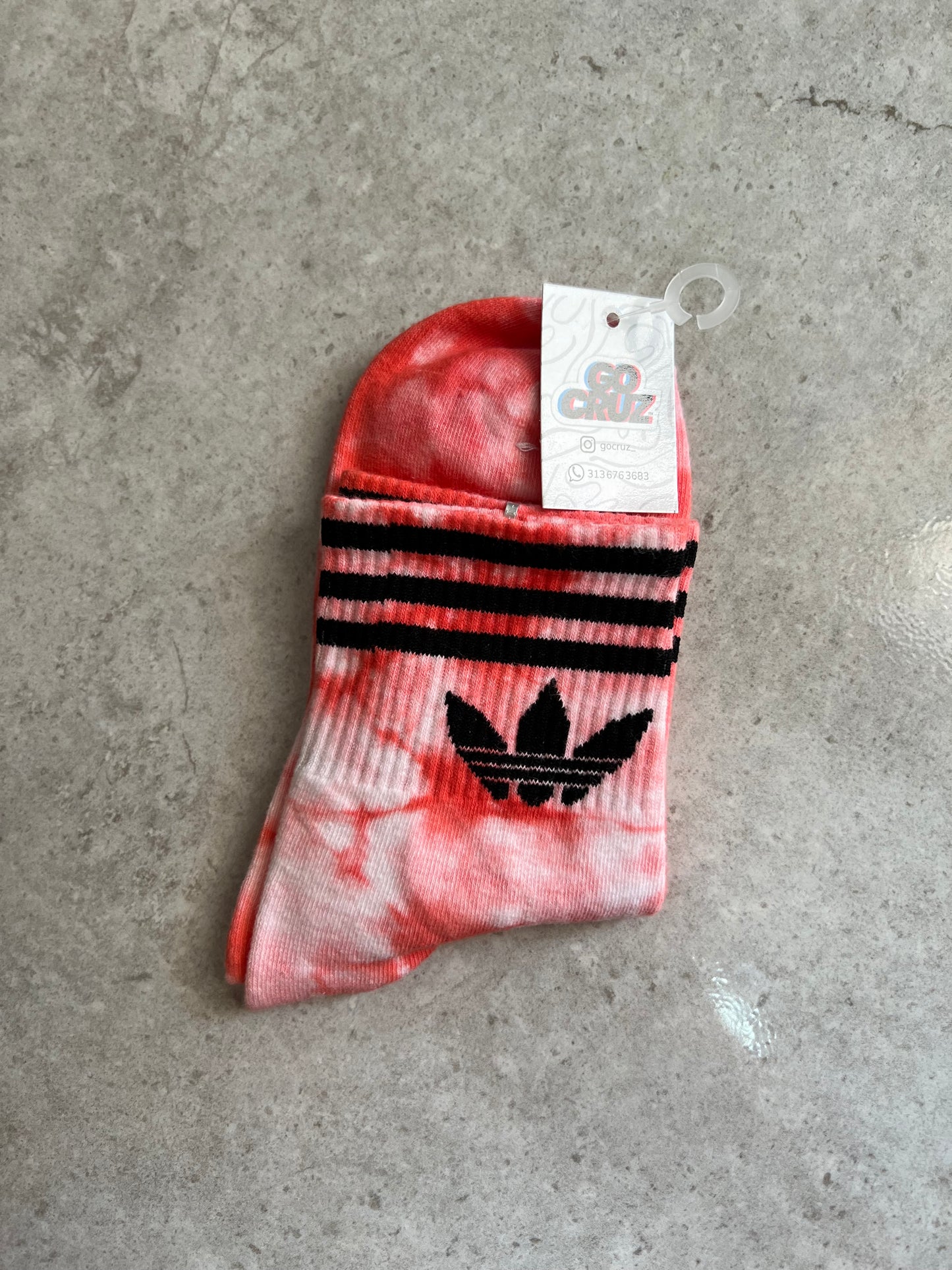 Adidas mancha roja