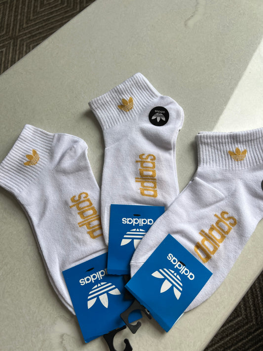Semi corta Adidas amarilla