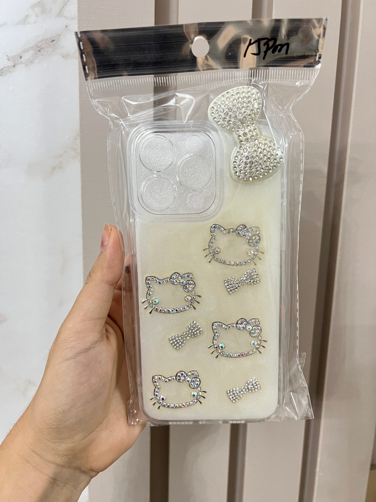 Hello kitty piedras 15 pro Max