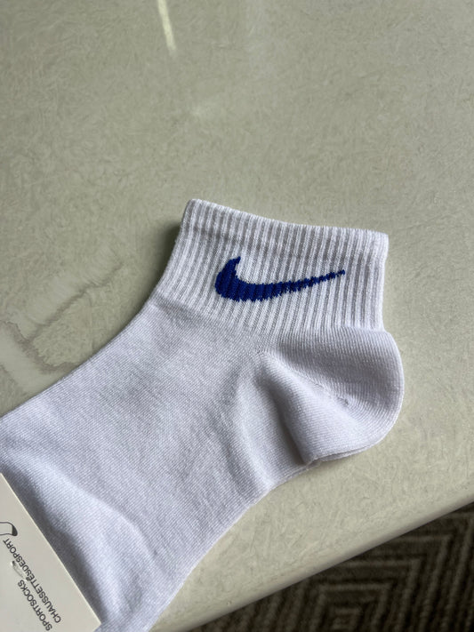 Semi corta Nike azul